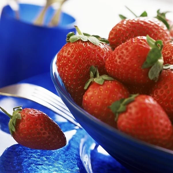 Strawberries in blue bowl