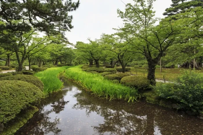 Framed Print : Stream with lush greenery and reflections, Kenrokuen, one of Japans most beautiful Framed Print : Stream with lush greenery and reflections, Kenrokuen, one of Japans most beautiful