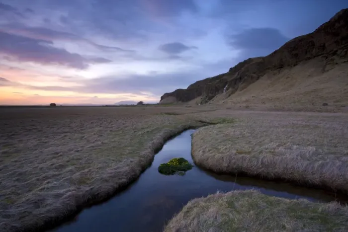 Framed Print : Stream meandering into the distance and reflecting colours in the twilight sky Framed Print : Stream meandering into the distance and reflecting colours in the twilight sky