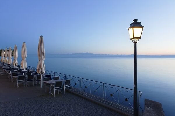 Street cafe on a promenade at sunset, Meersburg, Lake Constance (Bodensee), Baden Wurttemberg, Germany, Europe