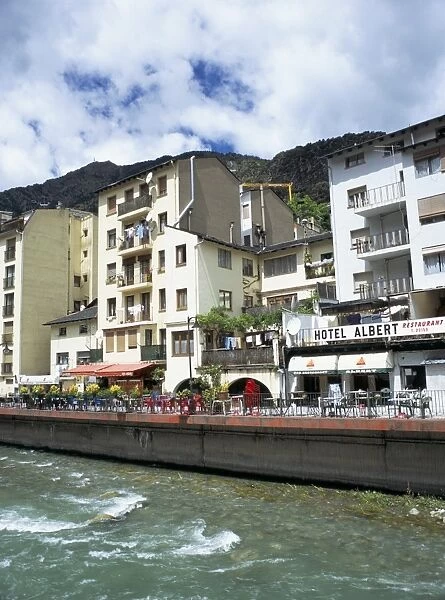 Street cafes on the bank of Riu Valira which runs through the capital city