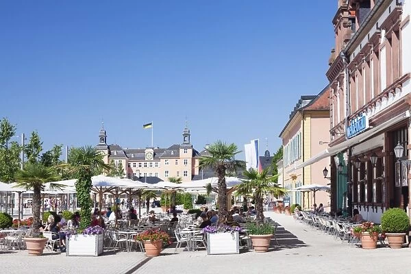 Street cafes and Schloss Schwetzingen Palace, Schwetzingen, Rhein-Neckar-Kreis, Baden Wurttemberg, Germany, Europe