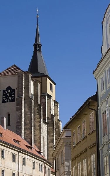 Street with church spire, Old Town, Prague, Czech Republic, Europe