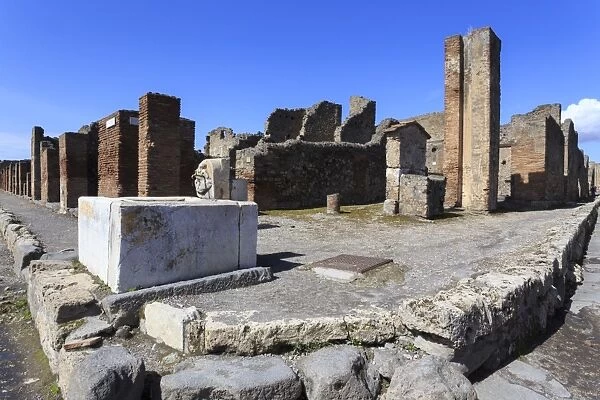 Street corner with public fountain, Roman ruins of Pompeii, UNESCO World Heritage Site