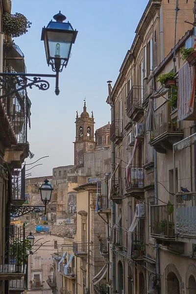 Street lanterns and houses in the typical alleys of the old town, Caltagirone, Province of Catania