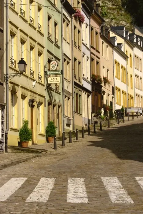 Framed Print : Street scene of cafe and houses in the valley village of Grund Framed Print : Street scene of cafe and houses in the valley village of Grund