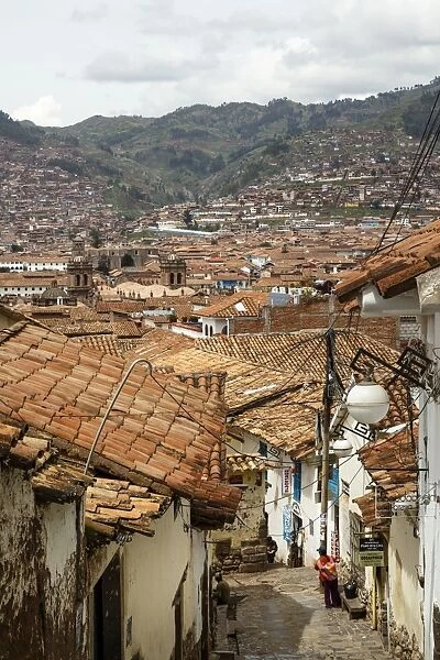Street scene in San Blas neighbourhood with a view over the rooftops of Cuzco, UNESCO World Heritage Site, Peru, South America