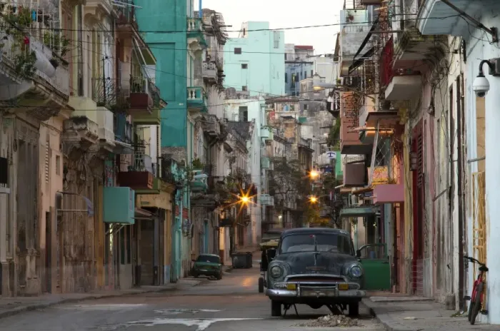 Framed Print : Street scene before sunrise showing dilapidated buildings crowded together and vintage American cars, Havana Centro, Havana, Cuba, West Indies, Caribbean, Central America Framed Print : Street scene before sunrise showing dilapidated buildings crowded together and vintage American cars, Havana Centro, Havana, Cuba, West Indies, Caribbean, Central America