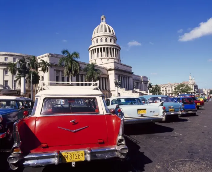 Framed Print : Street scene of taxis parked near the Capitolio Building in Central Havana Framed Print : Street scene of taxis parked near the Capitolio Building in Central Havana