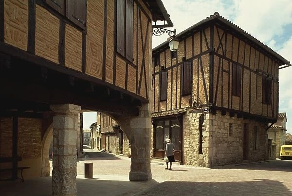 Street scene with timbered houses, Castelnau de Montmirail, Tarn, Midi-Pyrenees