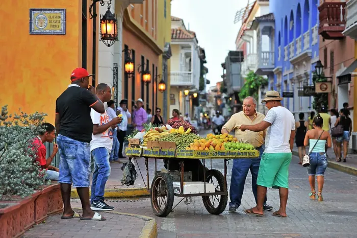 Framed Print : Street vendor of fruits inside the downtown colonial walled city, Cartagena, Colombia, South America Framed Print : Street vendor of fruits inside the downtown colonial walled city, Cartagena, Colombia, South America
