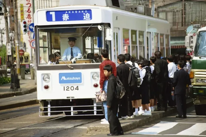 Framed Print : Students boarding a bus in Nagasaki Framed Print : Students boarding a bus in Nagasaki