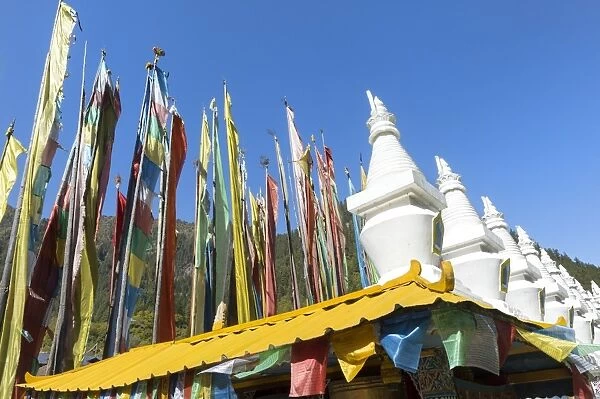 Stupas and flags at Shuzheng Tibetan village, Jiuzhaigou National Park, UNESCO World Heritage Site