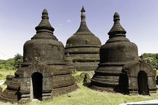 Three stupas of Ratanabon temple with clear blue sky behind, Mrauk U, Rakhine