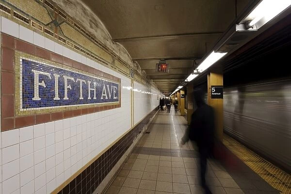 Subway station and train in motion, Manhattan, New York City, New York
