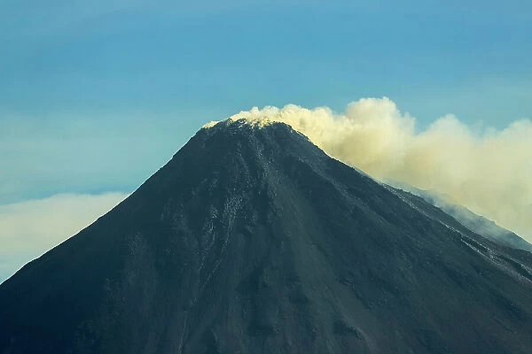 Sulphur smoke atop this active 1784m Pacific Ring of Fire volcano, Mount Karangetang, Siau, Sangihe Islands, Sulawesi, Indonesia, Southeast Asia, Asia