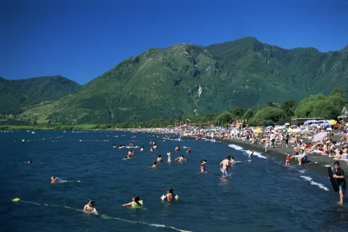 Framed Print : Summer crowds enjoy warm water, Lake Villarica, Lake District, Chile, South America Framed Print : Summer crowds enjoy warm water, Lake Villarica, Lake District, Chile, South America