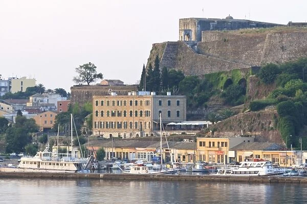Summer dawn, Corfu Town fortifications and harbour from the sea, UNESCO World Heritage Site, Corfu, Ionian Islands, Greek Islands, Greece, Europe