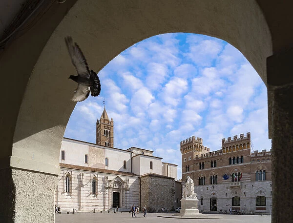 Summer sky over Canapone monument statue and Duomo, Piazza Dante, Grosseto, Tuscany