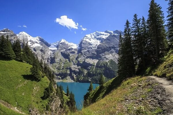 Summer view of Lake Oeschinensee, Bernese Oberland, Kandersteg, Canton of Bern, Switzerland