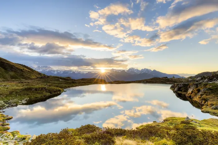 Framed Print : The sun and clouds reflected in the Arcoglio Lake at sunrise, Valmalenco, Valtellina