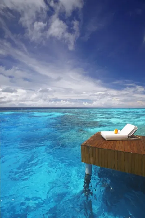Framed Print : Sun lounger and jetty in blue lagoon, Maldives, Indian Ocean, Asia Framed Print : Sun lounger and jetty in blue lagoon, Maldives, Indian Ocean, Asia