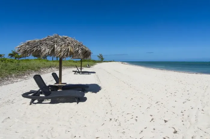 Framed Print : Sun lounger on a white sand beach in northern Providenciales, Turks and Caicos, Caribbean Framed Print : Sun lounger on a white sand beach in northern Providenciales, Turks and Caicos, Caribbean