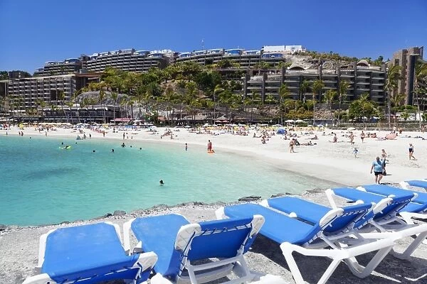Sun loungers at a beach, Arguineguin, Anfi del Mar, Playa de la Verga, Gran Canaria, Canary Islands, Spain, Atlantic, Europe