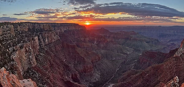 The sun rising at Grand Canyon North Rim, viewed from the Angels Window Overlook at Cape Royal, Grand Canyon National Park, UNESCO World Heritage Site, Arizona, United States of America, North America