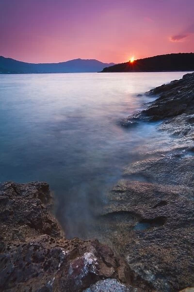 Sun star at sunrise in Korcula Town, Korcula Island, Dalmatian Coast, Adriatic, Croatia, Europe