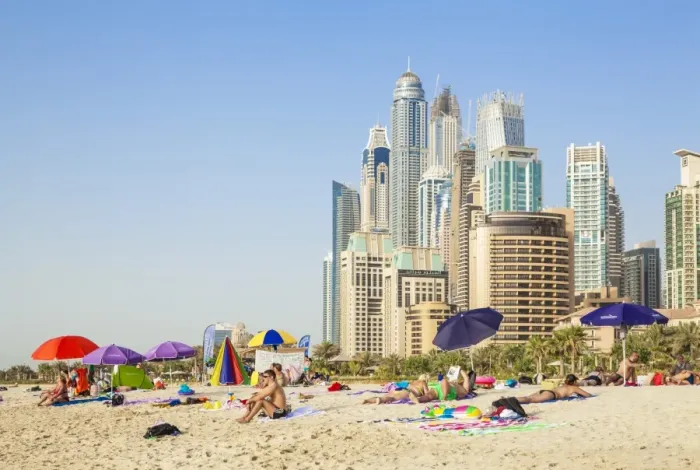Framed Print : Sunbathers on the Public Dubai Beach at JBR (Jumeirah Beach Resort), Dubai, United Arab Emirates Framed Print : Sunbathers on the Public Dubai Beach at JBR (Jumeirah Beach Resort), Dubai, United Arab Emirates