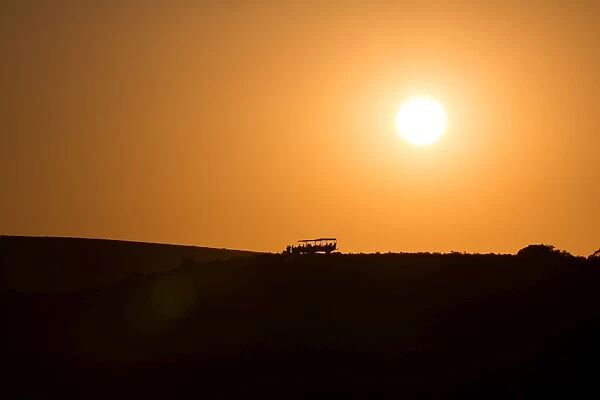 Sundowners at sunset over a South African Game Reserve, Eastern Cape, South Africa