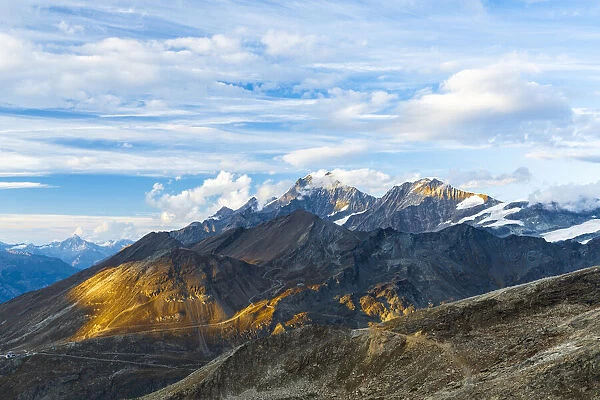 Sunlight over the majestic peaks of Dom, Taschhorn and Alphubel mountains, Zermatt