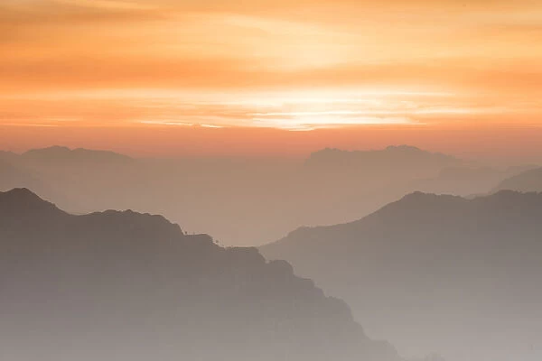 Sunrise on the Bergamo Orobie Alps seen from Monte Coltignone, Lecco, Lombardy, Italian Alps