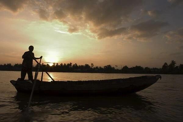 Sunrise, boats on the Mekong Delta