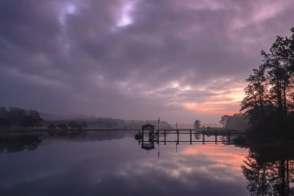 Sunrise and dock on intracoastal waterway, Calabash, North Carolina, United States of America