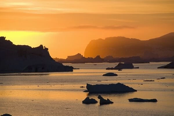 Sunrise on ice in the Antarctic Sound, Antarctic Peninsula, Antarctica, Polar Regions