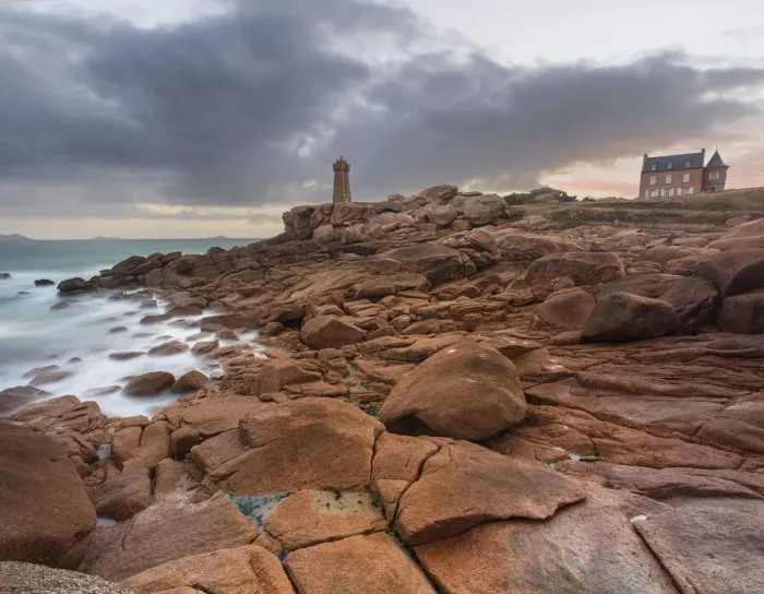 Framed Print : Sunrise long exposure at Ploumanach lighthouse and a house over the pink granite coast, Cotes d Armor, Brittany, France, Europe Framed Print : Sunrise long exposure at Ploumanach lighthouse and a house over the pink granite coast, Cotes d Armor, Brittany, France, Europe