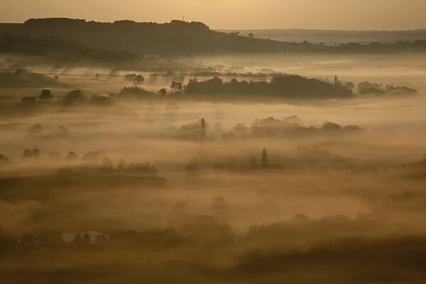 Sunrise over misty valley from the terrace, Vezelay, Burgundy, France, Europe