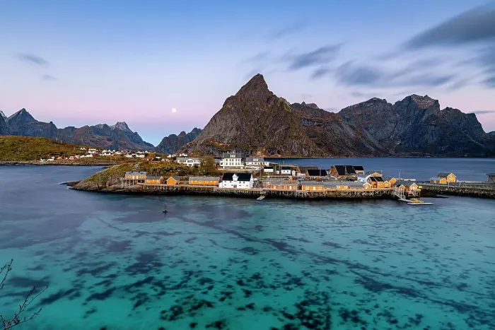 Framed Print : Sunrise over Olstind mountain and fishing village of Sakrisoy overlooking the cold blue sea, Lofoten Islands, Nordland, Norway, Scandinavia, Europe Framed Print : Sunrise over Olstind mountain and fishing village of Sakrisoy overlooking the cold blue sea, Lofoten Islands, Nordland, Norway, Scandinavia, Europe