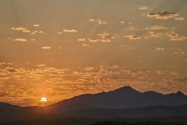 Sunrise over stacked hills, Namaqua National Park, Namakwa, Namaqualand, South Africa