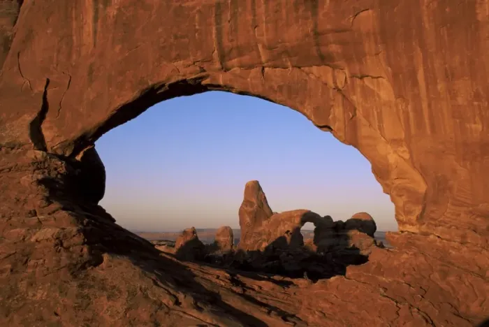 Framed Print : Sunrise, Turret Arch seen through North Window Framed Print : Sunrise, Turret Arch seen through North Window