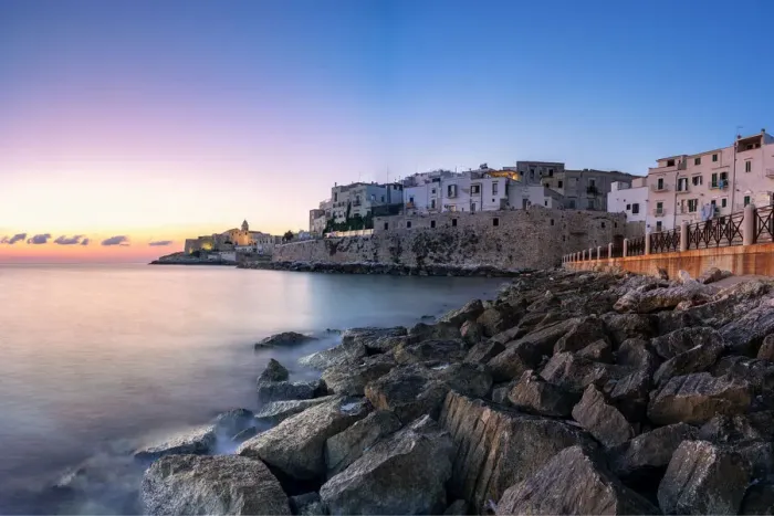 Framed Print : Sunrise over Vieste old town on headland by the sea, Foggia province Framed Print : Sunrise over Vieste old town on headland by the sea, Foggia province
