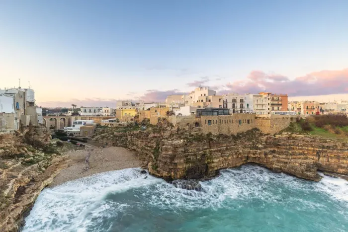 Framed Print : Sunrise with view on the beach of Lama Monachile from above, Polignano a Mare, Apulia Framed Print : Sunrise with view on the beach of Lama Monachile from above, Polignano a Mare, Apulia