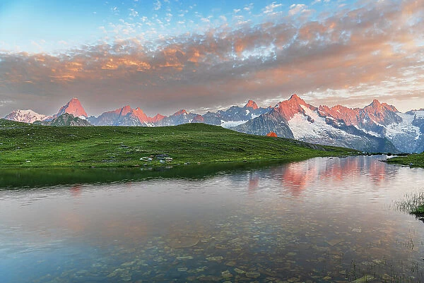 Sunrise view over the shore of Fenetre lake with the massif of Mount Blanc, Fenetre lake, Ferret valley, Valais canton, Col du Grand-Saint-Bernard (St. Bernard mountain pass), Switzerland, Europe