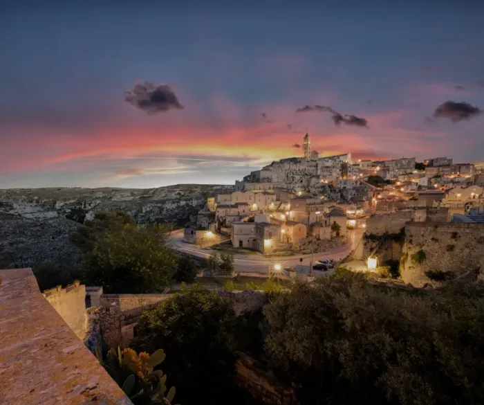 Framed Print : Sunset on the ancient town and historical center called Sassi, perched on rocks on top of hill Framed Print : Sunset on the ancient town and historical center called Sassi, perched on rocks on top of hill