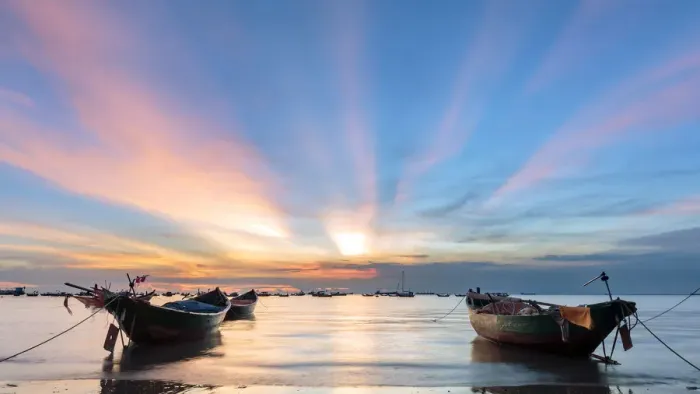 Framed Print : Sunset from Front beach, Vung Tau with pink clouds and small fishing boats in Framed Print : Sunset from Front beach, Vung Tau with pink clouds and small fishing boats in