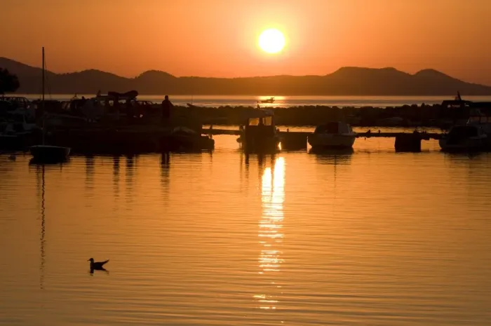 Framed Print : Sunset with boats in the foreground near Zardar, Croatia, Europe Framed Print : Sunset with boats in the foreground near Zardar, Croatia, Europe