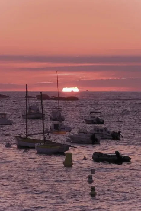 Framed Print : Sunset over boats moored at sea, Tregastel, Cote de Granit Rose, Cotes d Armor Framed Print : Sunset over boats moored at sea, Tregastel, Cote de Granit Rose, Cotes d Armor