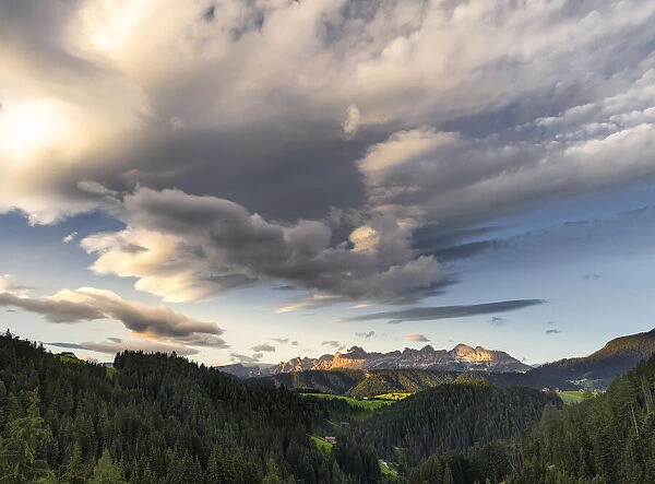 Sunset on Catinaccio mountain in the Dolomites and cloud cover, Trentino-Alto Adige